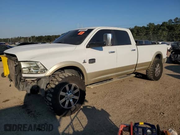2012 Dodge RAM с VIN 3C6UD5LL4CG338615, выставлен на аукционе Copart как лот 74345004 с пробегом 232 166 миль миль и Списание • Salvage title. История ставок и продаж доступна на DreamBid. Изображение 1.