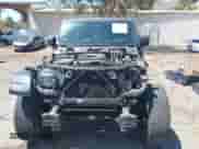 2021 Jeep Wrangler Unlimited Sport S with VIN 1C4HJXDN4MW596523, listed as a IAAI auction lot 43094668 with 128,511 mi miles and . Bid and sale history available at DreamBid. Image 13.