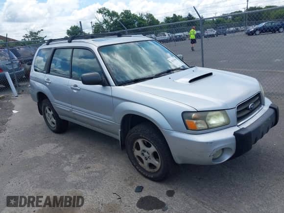 2004 Subaru Forester XT with VIN JF1SG69694H711031, listed as a IAAI auction lot 42632995 with 210,093 mi miles and . Bid and sale history available at DreamBid. Image 1.