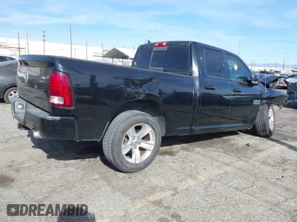 2014 Ram 1500 Sport with VIN 1C6RR6HTXES458906, listed as a IAAI auction lot 41411167 with Not provided miles and . Bid and sale history available at DreamBid. Image 4.
