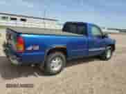 2003 GMC Sierra 1500 SLE z VIN 1GTEK14V43Z240678, wystawiony jako Copart lot #56372285 z przebiegiem 243 387 mil mil oraz Czysty tytuł • Clean title. Historia ofert i sprzedaży dostępna na DreamBid. Obrazek 3.