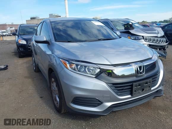 2020 Honda HR-V LX with VIN 3CZRU6H34LM718014, listed as a IAAI auction lot 43014610 with 77,699 mi miles and . Bid and sale history available at DreamBid. Image 1.