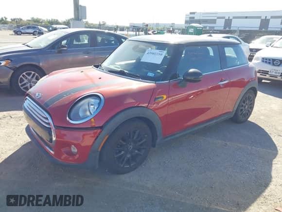 2014 MINI Hardtop with VIN WMWXM5C57ET730255, listed as a IAAI auction lot 43502210 with Not provided miles and . Bid and sale history available at DreamBid. Image 2.