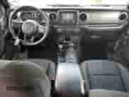 2021 Jeep Wrangler Unlimited Willys Sport with VIN 1C4HJXDG9MW788084, listed as a Copart auction lot 81259435 with 47,756 mi miles and Salvage title. Bid and sale history available at DreamBid. Image 8.