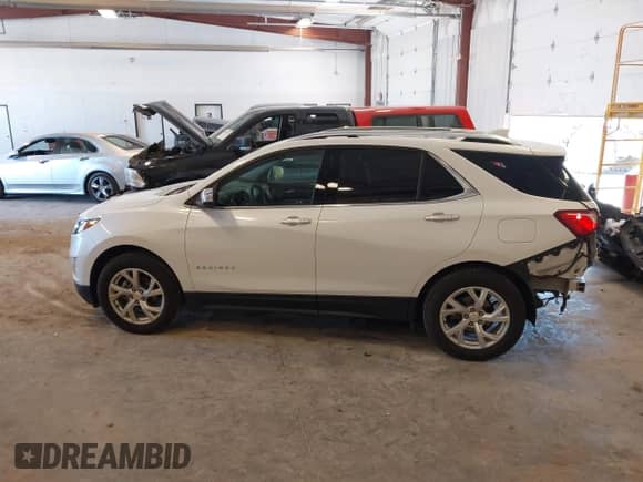 2021 Chevrolet Equinox Premier z VIN 3GNAXXEV0MS119024, wystawiony jako IAAI lot #42550302 z przebiegiem 41 544 mil mil oraz . Historia ofert i sprzedaży dostępna na DreamBid. Obrazek 14.
