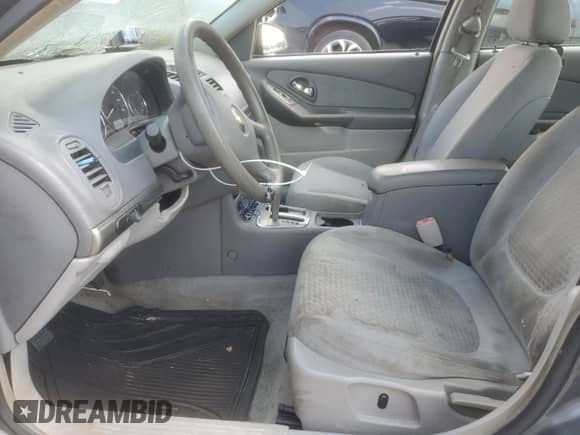 2006 Chevrolet Malibu 1FL z VIN 1G1ZS51896F158225, wystawiony jako Copart lot #69076055 z przebiegiem Nie podano mil oraz Szkoda całkowita • Salvage title. Historia ofert i sprzedaży dostępna na DreamBid. Obrazek 7.