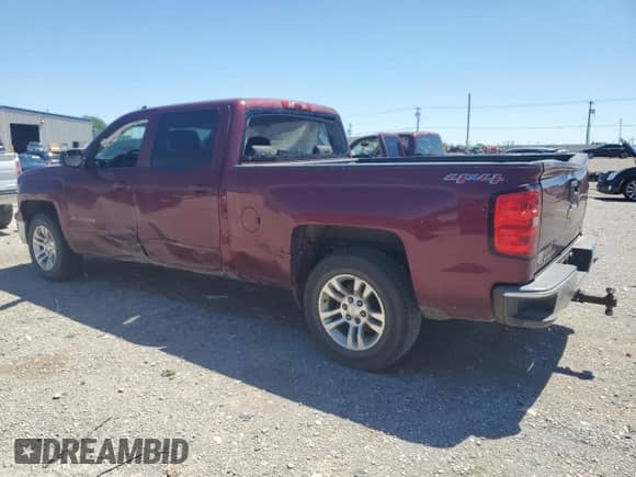 2015 Chevrolet Silverado 1500 LT with VIN 3GCUKREH0FG441291, listed as a Copart auction lot 53348275 with 159,063 mi miles and Salvage title. Bid and sale history available at DreamBid. Image 2.