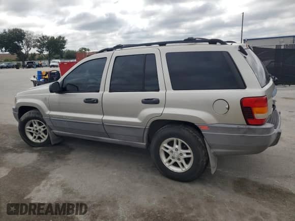 2004 Jeep Grand Cherokee Laredo с VIN 1J4GW48S74C315077, выставлен на аукционе Copart как лот 84575215 с пробегом 152 289 миль миль и Чистый • Clean title. История ставок и продаж доступна на DreamBid. Изображение 2.