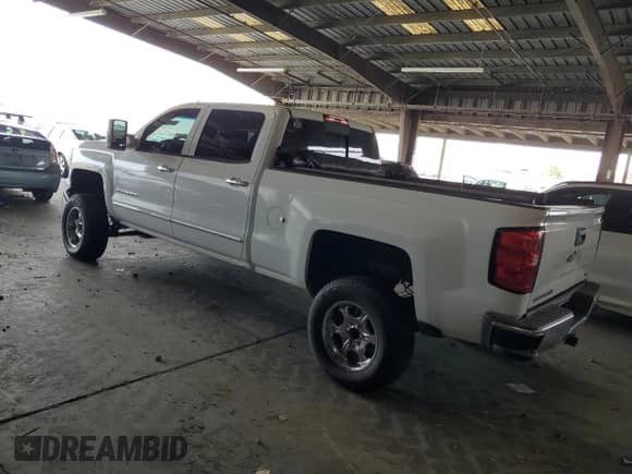 2014 Chevrolet Silverado 1500 LTZ z VIN 1GCUKSEC4EF194630, wystawiony jako Copart lot #81909935 z przebiegiem 183 428 mil mil oraz Szkoda całkowita • Salvage title. Historia ofert i sprzedaży dostępna na DreamBid. Obrazek 2.