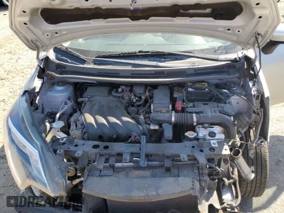 2018 Nissan Note SV z VIN 3N1CE2CP8JL368260, wystawiony jako Copart lot #65828605 z przebiegiem 55 117 mil mil oraz Szkoda całkowita • Salvage title. Historia ofert i sprzedaży dostępna na DreamBid. Obrazek 11.