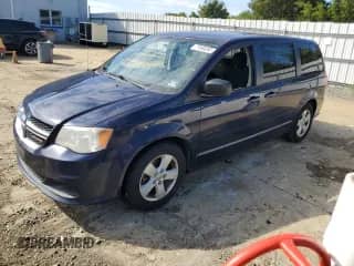 2013 Dodge Grand Caravan SE with VIN 2C4RDGBG6DR702866, listed as a Copart auction lot 71869265 with 158,459 mi miles and Clean title. Bid and sale history available at DreamBid. Image 1.
