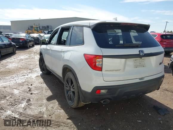 2021 Honda Passport Sport z VIN 5FNYF7H25MB000793, wystawiony jako IAAI lot #41350844 z przebiegiem 54 958 mil mil oraz . Historia ofert i sprzedaży dostępna na DreamBid. Obrazek 3.