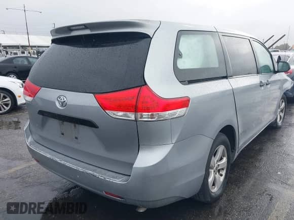 2012 Toyota Sienna with VIN 5TDZK3DC6CS263912, listed as a IAAI auction lot 42174360 with 95,216 mi miles and . Bid and sale history available at DreamBid. Image 4.