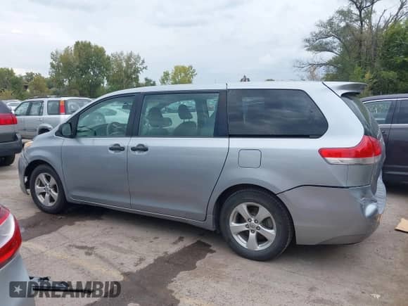 2014 Toyota Sienna L with VIN 5TDZK3DCXES497697, listed as a IAAI auction lot 43397896 with 247,187 mi miles and . Bid and sale history available at DreamBid. Image 15.