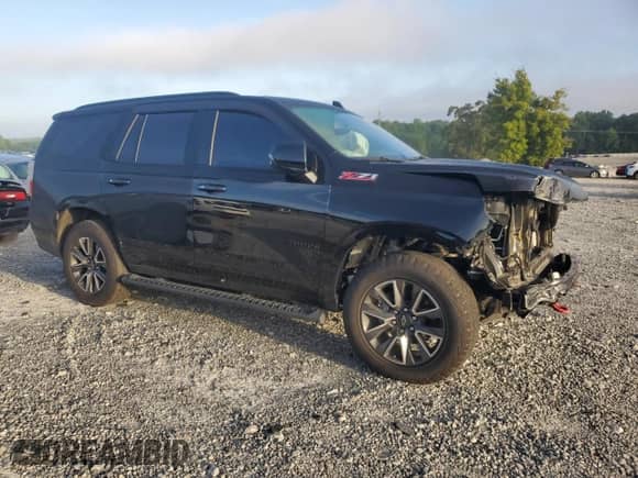 2022 Chevrolet Tahoe Z71 с VIN 1GNSKPKD5NR161157, выставлен на аукционе Copart как лот 64448385 с пробегом 67 936 миль миль и Списание • Salvage title. История ставок и продаж доступна на DreamBid. Изображение 4.