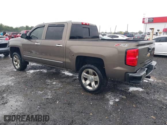 2014 Chevrolet Silverado 1500 LTZ with VIN 3GCUKSEC6EG167024, listed as a IAAI auction lot 42337467 with 198,721 mi miles and . Bid and sale history available at DreamBid. Image 3.