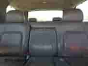 2002 Cadillac Escalade with VIN 1GYEC63T42R189976, listed as a Copart auction lot 57852565 with 243,089 mi miles and Salvage title. Bid and sale history available at DreamBid. Image 10.