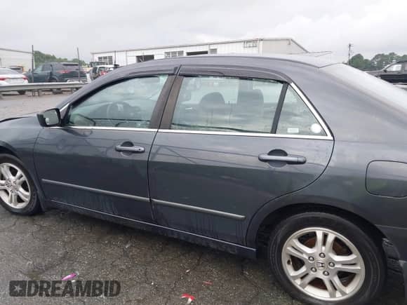 2006 Honda Accord EX with VIN 1HGCM56716A005442, listed as a IAAI auction lot 42792770 with 268,520 mi miles and . Bid and sale history available at DreamBid. Image 14.