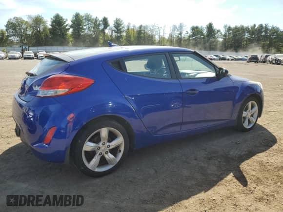 2013 Hyundai Veloster w/Gray Int z VIN KMHTC6ADXDU176024, wystawiony jako Copart lot #82231875 z przebiegiem 115 819 mil mil oraz Czysty tytuł • Clean title. Historia ofert i sprzedaży dostępna na DreamBid. Obrazek 3.