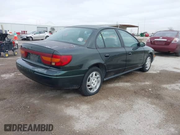 2000 Saturn SL with VIN 1G8ZK5276YZ210810, listed as a IAAI auction lot 41418014 with 93,078 mi miles and . Bid and sale history available at DreamBid. Image 4.