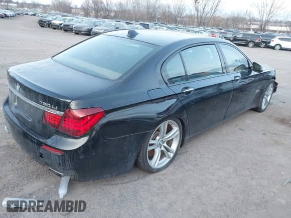2014 BMW 7 Series ALPINA B7 xDrive with VIN WBAYF8C50ED652735, listed as a IAAI auction lot 41153015 with 134,150 mi miles and . Bid and sale history available at DreamBid. Image 4.