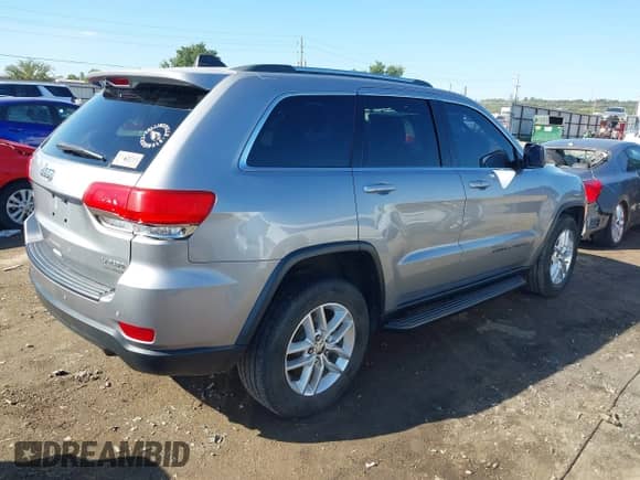 2017 Jeep Grand Cherokee Altitude with VIN 1C4RJFAG1HC683842, listed as a IAAI auction lot 43242272 with 149,432 mi miles and . Bid and sale history available at DreamBid. Image 4.