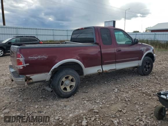 1999 Ford F-150 XL with VIN 2FTRX18L6XCA98588, listed as a Copart auction lot 82191215 with Not provided miles and Clean title. Bid and sale history available at DreamBid. Image 3.