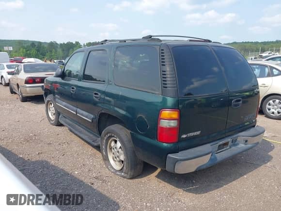 2002 Chevrolet Tahoe LS with VIN 1GNEC13V92J308220, listed as a IAAI auction lot 42362047 with 230,859 mi miles and . Bid and sale history available at DreamBid. Image 3.