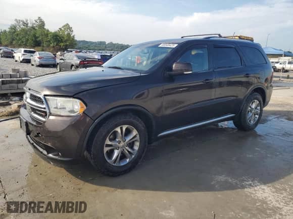 2012 Dodge Durango Crew with VIN 1C4RDHDG9CC306196, listed as a Copart auction lot 66848425 with 199,088 mi miles and Salvage title. Bid and sale history available at DreamBid. Image 1.