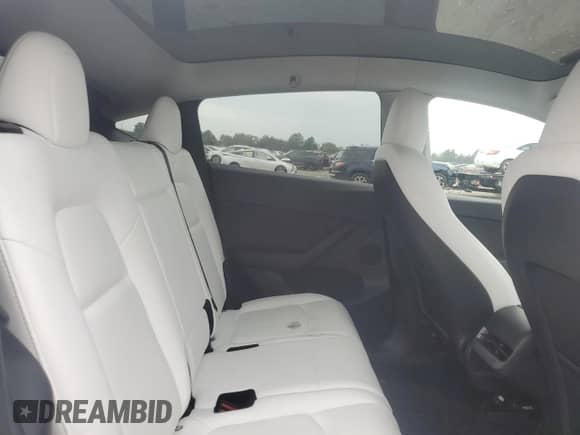 2023 Tesla Model Y Long Range с VIN 7SAYGAEE4PF693730, выставлен на аукционе Copart как лот 81366555 с пробегом 37 187 миль миль и Списание • Salvage title. История ставок и продаж доступна на DreamBid. Изображение 11.
