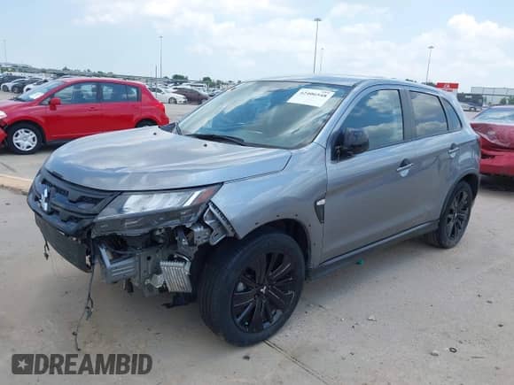 2023 Mitsubishi Outlander ES z VIN JA4ARUAU0PU016991, wystawiony jako IAAI lot #42406548 z przebiegiem 25 351 mil mil oraz . Historia ofert i sprzedaży dostępna na DreamBid. Obrazek 20.
