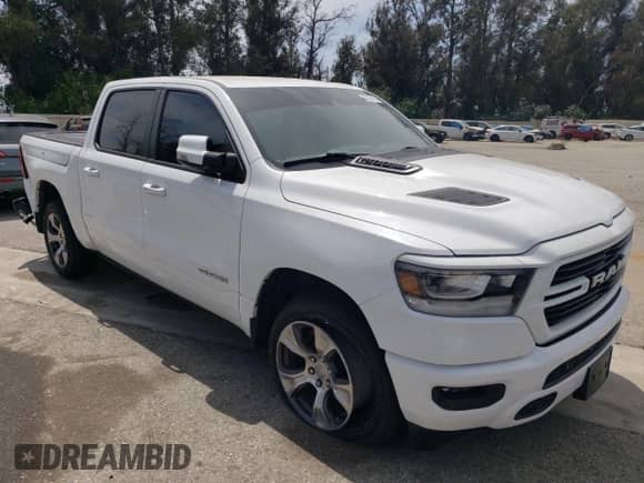 2023 Ram 1500 Laramie z VIN 1C6RREJTXPN565573, wystawiony jako Copart lot #57505115 z przebiegiem 29 298 mil mil oraz Szkoda całkowita • Salvage title. Historia ofert i sprzedaży dostępna na DreamBid. Obrazek 4.