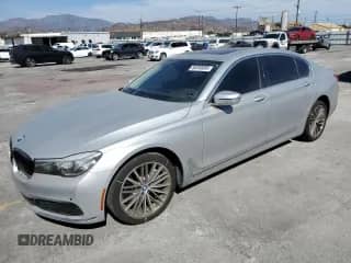 2018 BMW 7 Series 740i with VIN WBA7E2C56JG742086, listed as a Copart auction lot 69280085 with 69,457 mi miles and Salvage title. Bid and sale history available at DreamBid. Image 1.