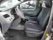 2013 Toyota Sienna SE with VIN 5TDXK3DCXDS347384, listed as a Copart auction lot 70305815 with 94,648 mi miles and Salvage title. Bid and sale history available at DreamBid. Image 7.
