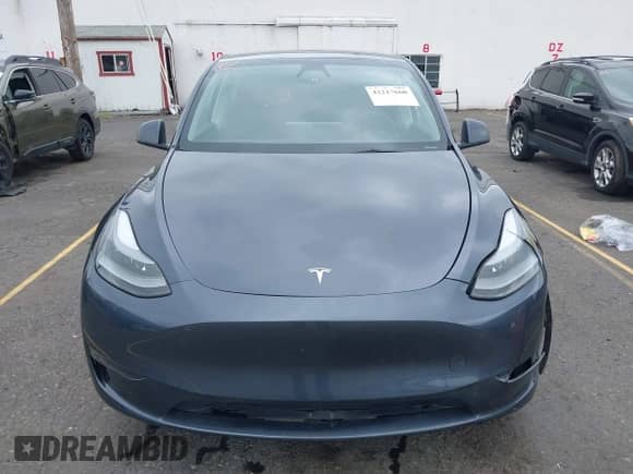 2023 Tesla Model Y Long Range with VIN 7SAYGDEE4PF806349, listed as a IAAI auction lot 42217660 with 39,898 mi miles and . Bid and sale history available at DreamBid. Image 13.