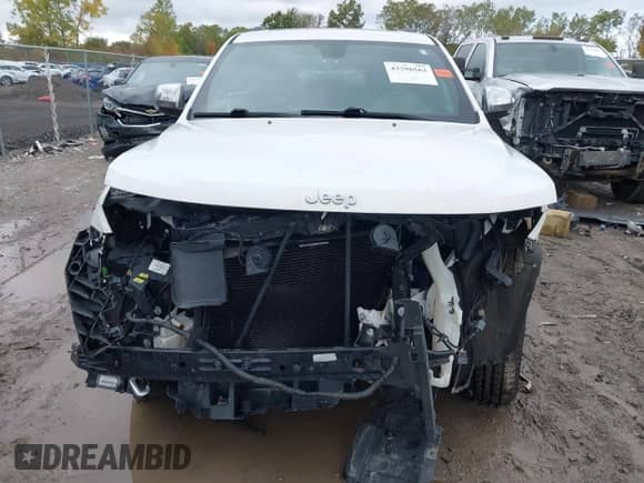 2018 Jeep Grand Cherokee Overland with VIN 1C4RJFCG1JC405736, listed as a IAAI auction lot 43296562 with 91,589 mi miles and . Bid and sale history available at DreamBid. Image 6.