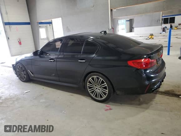 2018 BMW 5 Series M550i xDrive with VIN WBAJB9C54JB286660, listed as a Copart auction lot 62594805 with 137,794 mi miles and Salvage title. Bid and sale history available at DreamBid. Image 2.