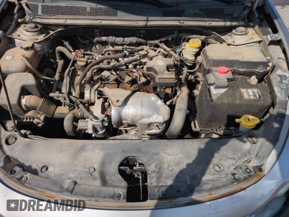 2014 Dodge Dart Aero z VIN 1C3CDFDHXED861811, wystawiony jako Copart lot #67539505 z przebiegiem 215 276 mil mil oraz Szkoda całkowita • Salvage title. Historia ofert i sprzedaży dostępna na DreamBid. Obrazek 11.