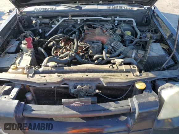 2003 Nissan Frontier SE with VIN 1N6ED27T23C436760, listed as a Copart auction lot 81446815 with 202,442 mi miles and Salvage title. Bid and sale history available at DreamBid. Image 11.