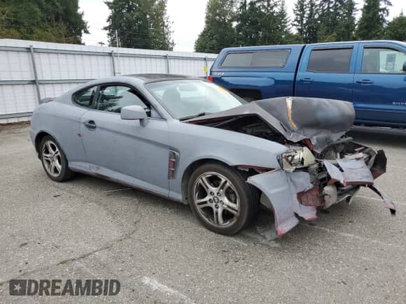 2005 Hyundai Tiburon GT с VIN KMHHN65F35U174824, выставлен на аукционе Copart как лот 81582545 с пробегом Не указан миль и Списание • Salvage title. История ставок и продаж доступна на DreamBid. Изображение 4.