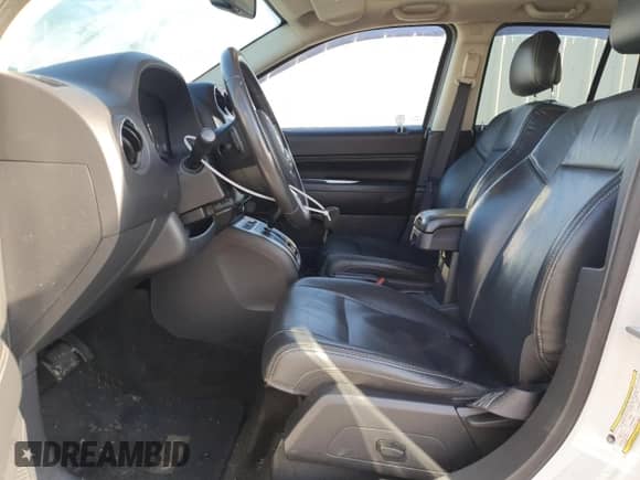 2017 Jeep Compass Latitude with VIN 1C4NJCEA9HD130529, listed as a Copart auction lot 52049285 with 82,338 mi miles and Salvage title. Bid and sale history available at DreamBid. Image 7.