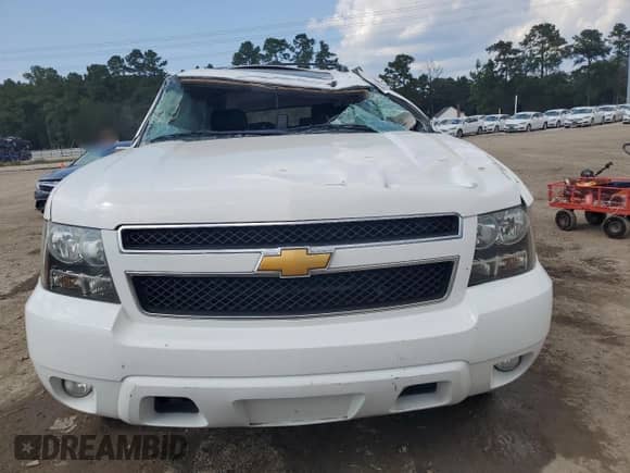 2014 Chevrolet Suburban LT с VIN 1GNSCJE0XER236440, выставлен на аукционе Copart как лот 69927065 с пробегом Не указан миль и Списание • Salvage title. История ставок и продаж доступна на DreamBid. Изображение 5.