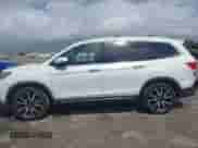 2020 Honda Pilot Elite with VIN 5FNYF6H05LB053582, listed as a IAAI auction lot 41721168 with 56,770 mi miles and . Bid and sale history available at DreamBid. Image 14.