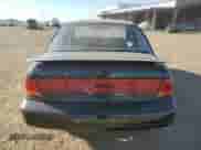 1996 Saturn SL with VIN 1G8ZK527XTZ335205, listed as a Copart auction lot 42230735 with 82,344 mi miles and Salvage title. Bid and sale history available at DreamBid. Image 6.