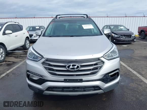 2018 Hyundai Santa Fe Ultimate with VIN 5XYZWDLA7JG542869, listed as a IAAI auction lot 41889520 with 51,294 mi miles and . Bid and sale history available at DreamBid. Image 12.