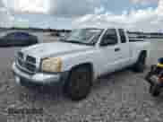 2005 Dodge Dakota SLT с VIN 1D7HE42N95S308273, выставлен на аукционе Copart как лот 66825675 с пробегом 104 340 миль миль и Чистый • Clean title. История ставок и продаж доступна на DreamBid. Изображение 1.