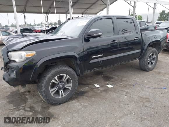 2017 Toyota Tacoma SR5 with VIN 3TMAZ5CN3HM026387, listed as a IAAI auction lot 42362780 with 216,739 mi miles and . Bid and sale history available at DreamBid. Image 2.