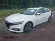 2018 Honda Accord Touring z VIN 1HGCV3F98JA002436, wystawiony jako IAAI lot #42436735 z przebiegiem 171 779 mil mil oraz . Historia ofert i sprzedaży dostępna na DreamBid. Obrazek 2.