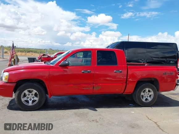 2006 Dodge Dakota SLT with VIN 1D7HW48K56S593288, listed as a IAAI auction lot 42590591 with 140,501 mi miles and . Bid and sale history available at DreamBid. Image 14.