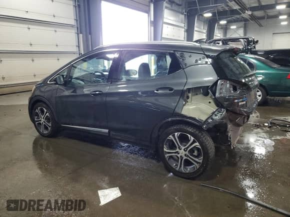 2018 Chevrolet Bolt EV Premier с VIN 1G1FX6S04J4108808, выставлен на аукционе Copart как лот 82117425 с пробегом 54 651 миль миль и Списание • Salvage title. История ставок и продаж доступна на DreamBid. Изображение 2.